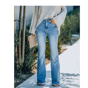 Jolie High Rise Distressed Flare Denim